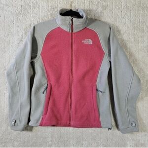 The North Face pink and gray zip up sweatshirt in good used condition.